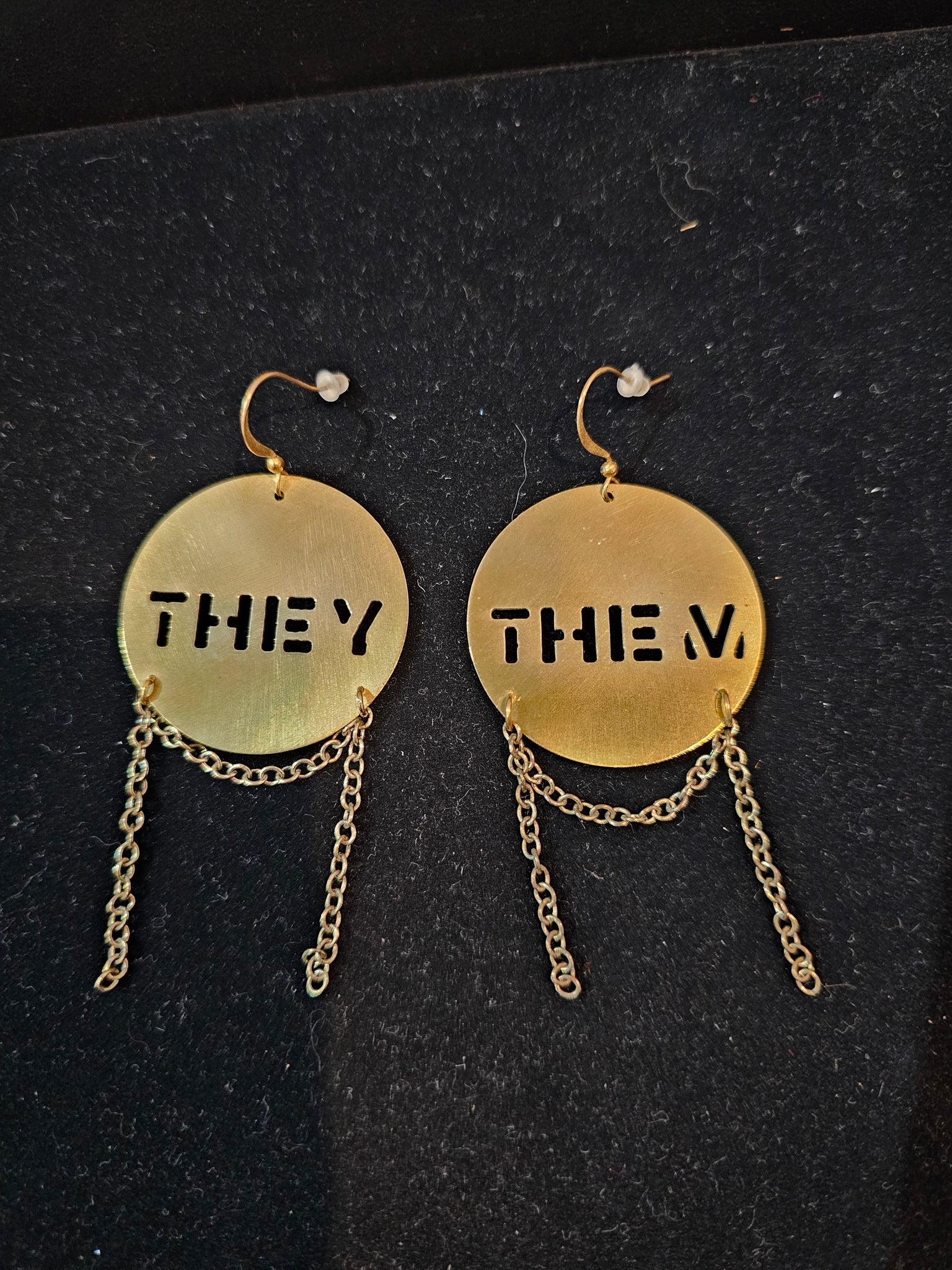 Brass They/Them Shield earrings