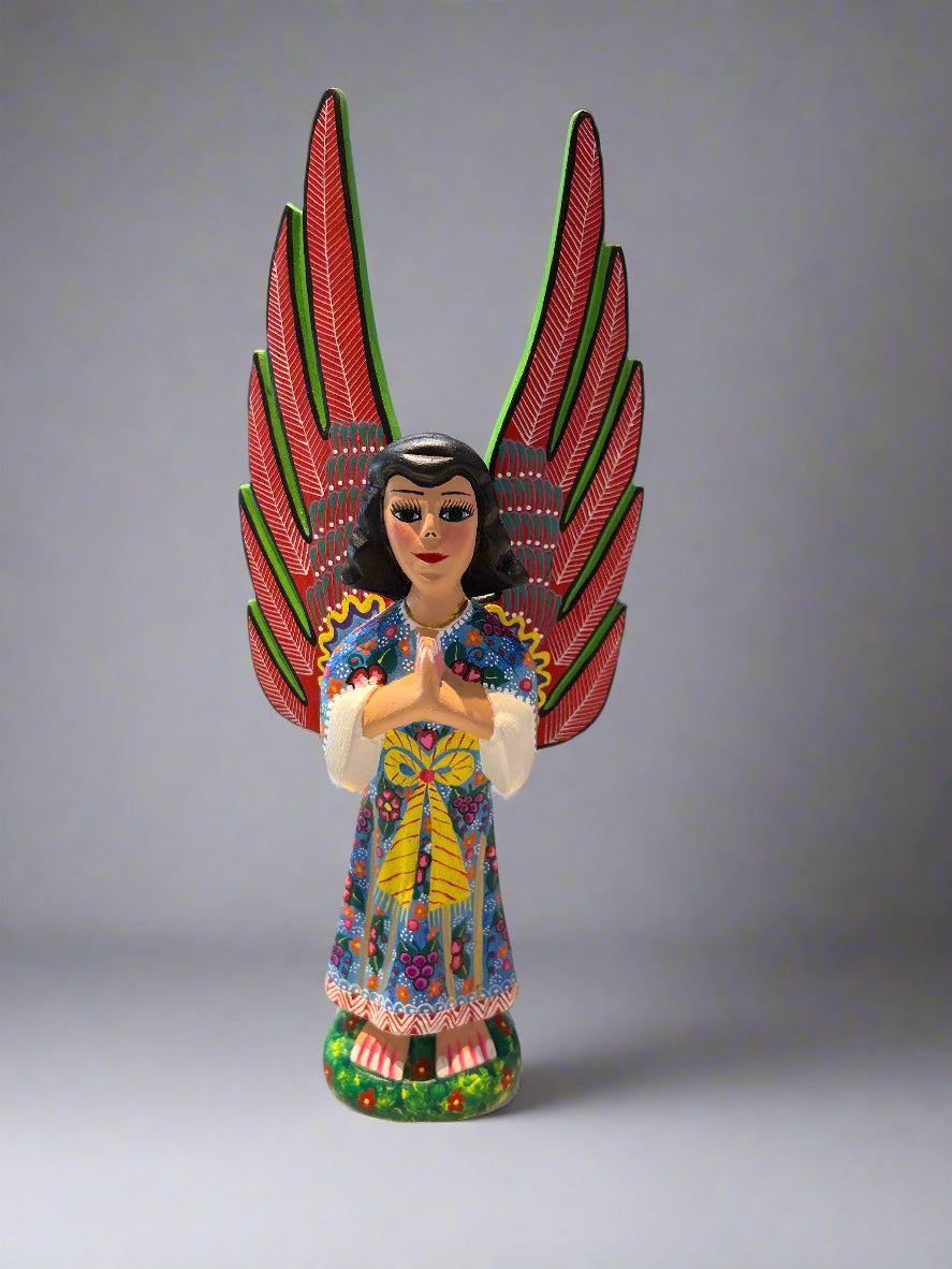 Decorative figurine with colorful wings in a store setting